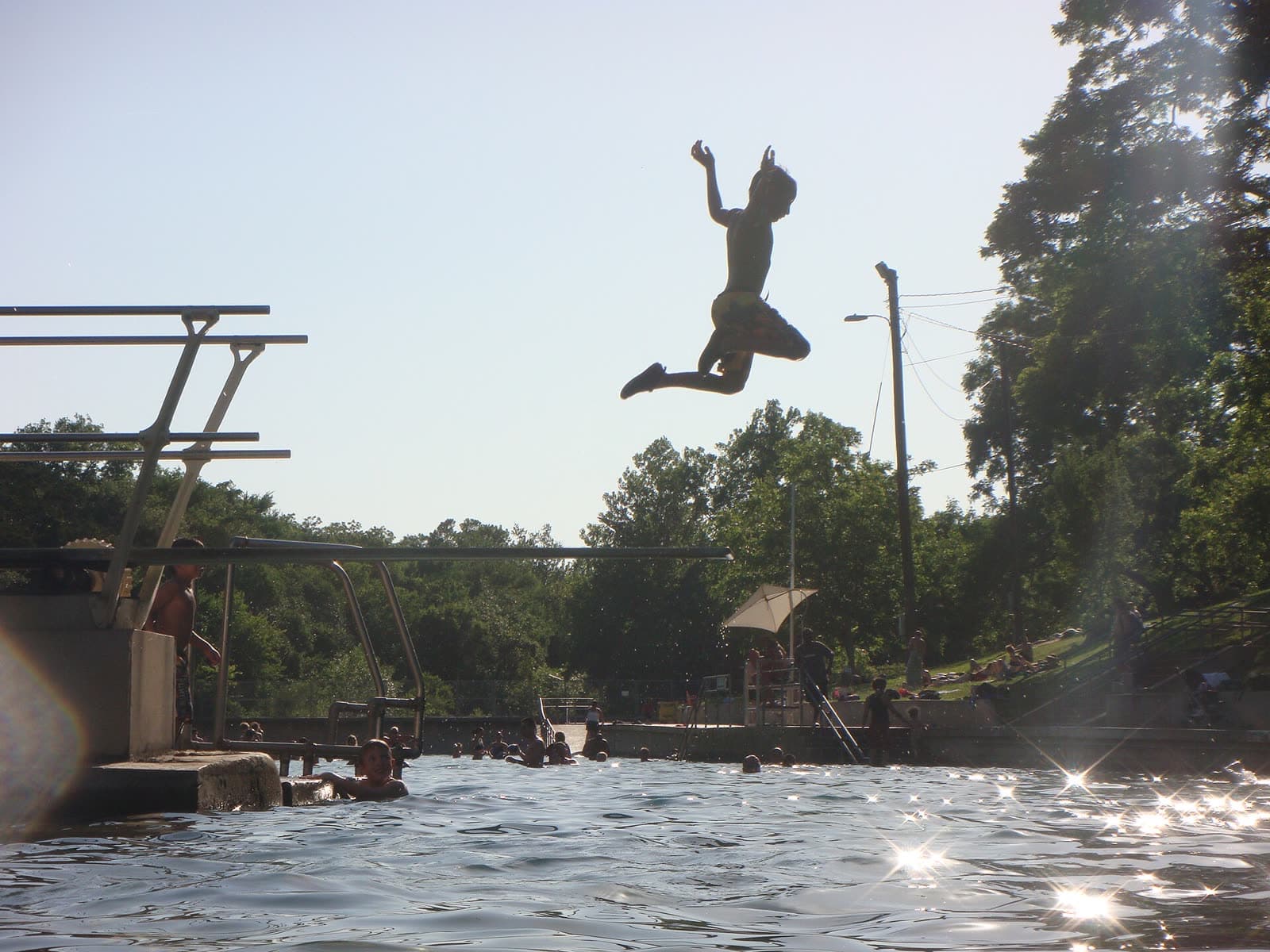 Barton Springs Pool, with trees around the water